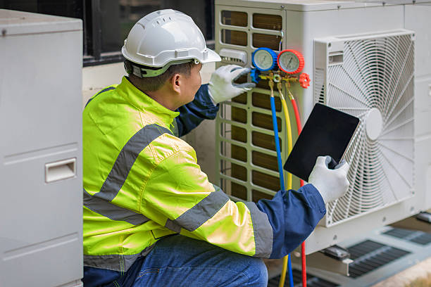 Professional Hvac technician working in Howell, MI